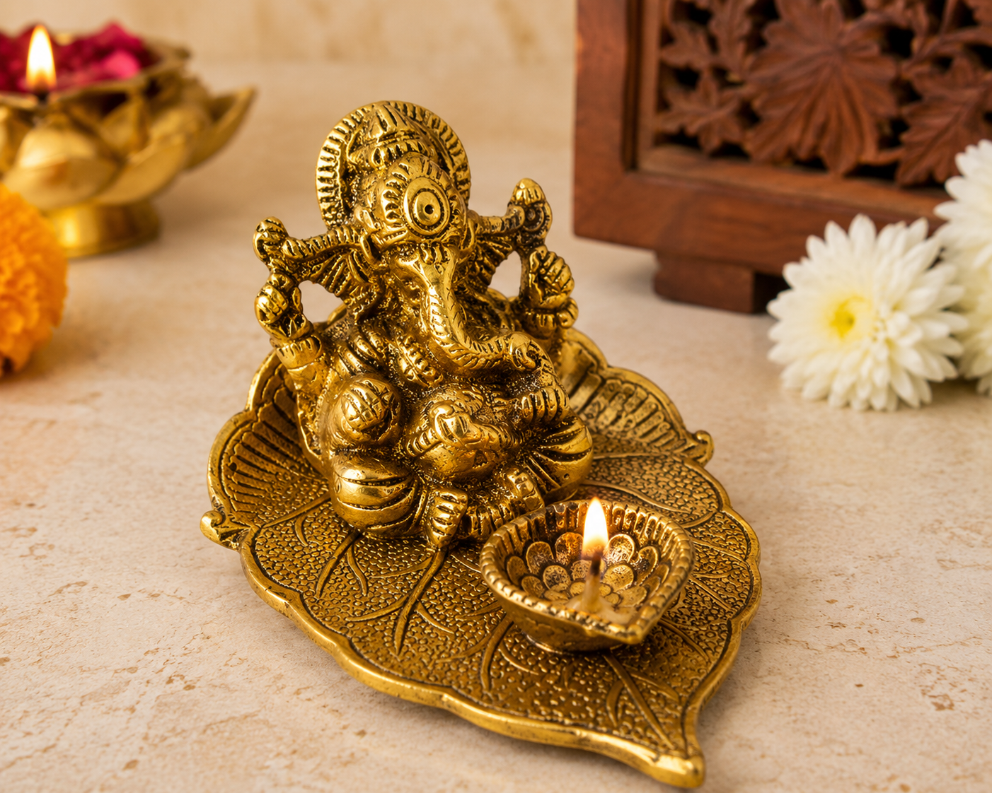 Brass Ganesha Idol with Diya on Leaf Stand – Antique Gold Finish Brass Ganesh Ji Statue for Pooja & Home Décor